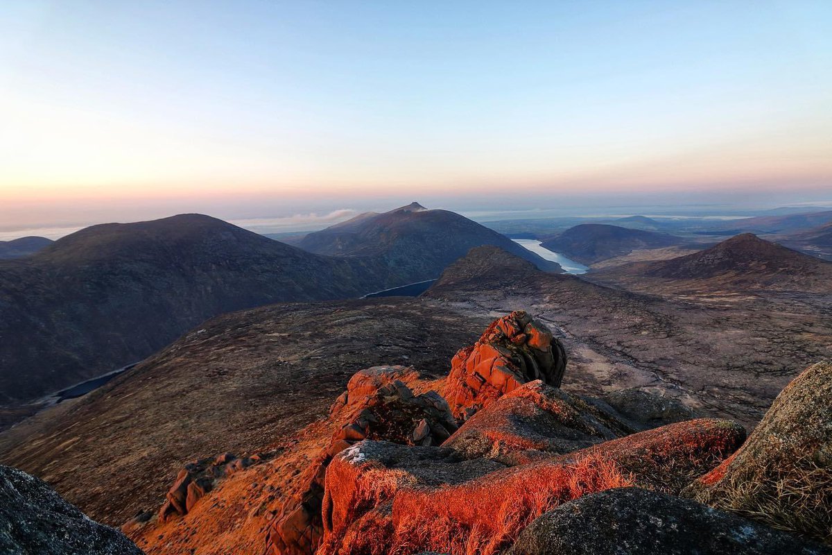 Waiting silently, watching as the sun overcomes the darkness and lights up the very Tor I’m standing on like a beacon for the world below. Bearnagh sunrise #beautiful #mournes #NorthernIreland