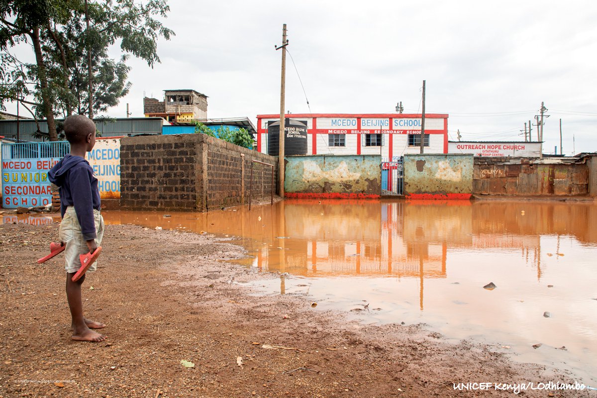 This young boy stands gazing upon his school submerged by floodwaters. Let this image not only evoke empathy but also inspire action. In such times of despair & loss, it's often the functioning school & friends who prove to be great levelers. #EducationMatters #ClimateCrisis