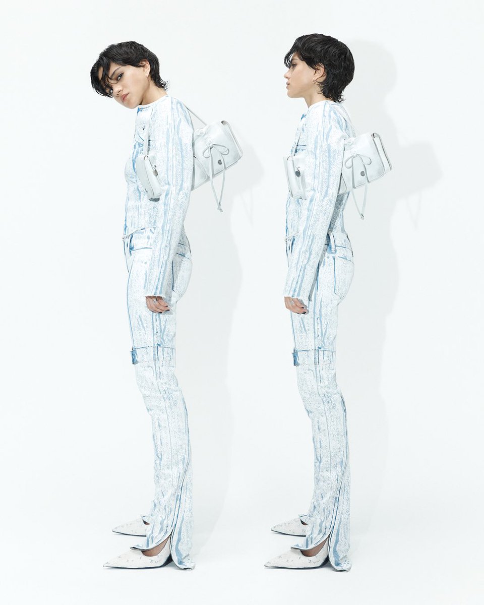 Doubled up denim. Actor Sasha Calle captured in painted denim runway pieces from our SS24 collection. Discover the edit at bit.ly/3y8wBxv. Photographer: Thomas Lohr Stylist: Léopold Duchemin Talent Stylist: Chloe and Chenelle Delgadillo