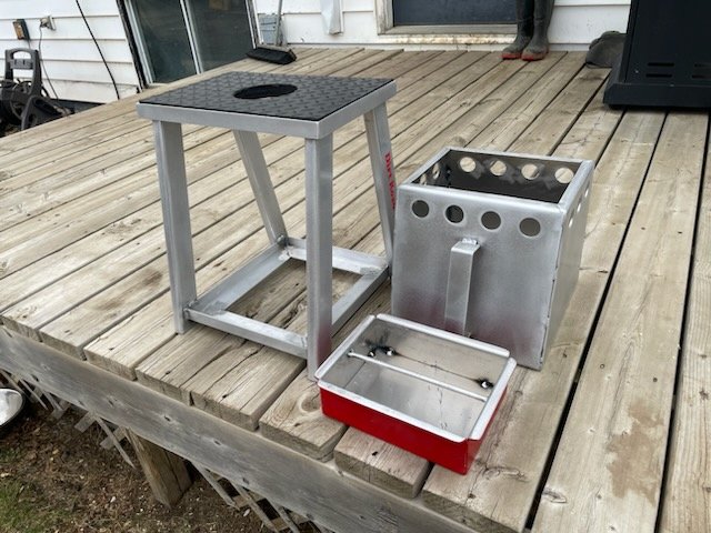A buddy of mine started building these dirtbike stands. Removable tool box underneath it. I like the way it turned. Let me know if anyone wants to order one and I'll get you his contact info. Re-tweets appreciated