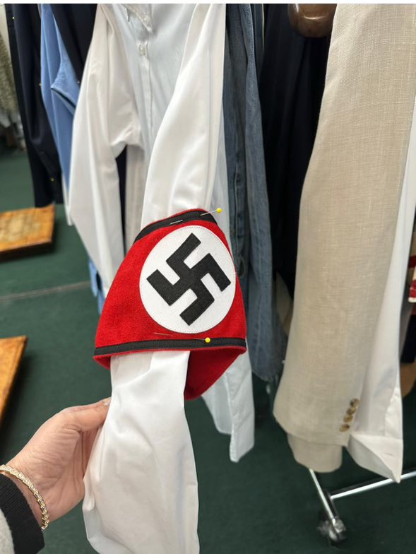 A constuient in my district alerted me to the fact that a tailor on the UES has this hanging in his queue to be tailored.  I have reached out to this business and they will not be tailoring this item and @NYPDnews is currently investigating.