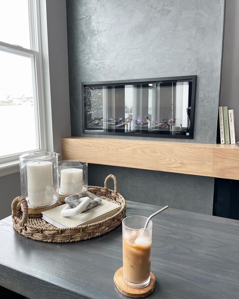 Iced or Hot? Best way to celebrate National Beverage Day? 
Chill by the fireplace with a fresh cup of coffee! 
Photo:  Sideline Elite 42 installation by Demi Halloran
#nationalbeverageday #interiordesigngoals #electricfireplace #touchstonehomeproducts