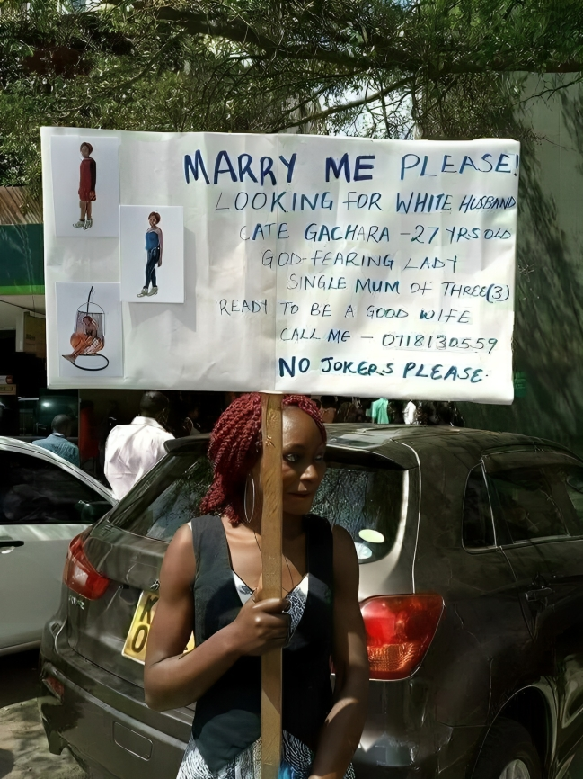'Ready to be a good wife,' says 27-year-old Catherine Gachara on her placard searching for a husband.

The mother of three says she is looking for a white man who will marry her.

Photo: Vinney Ke (Facebook)