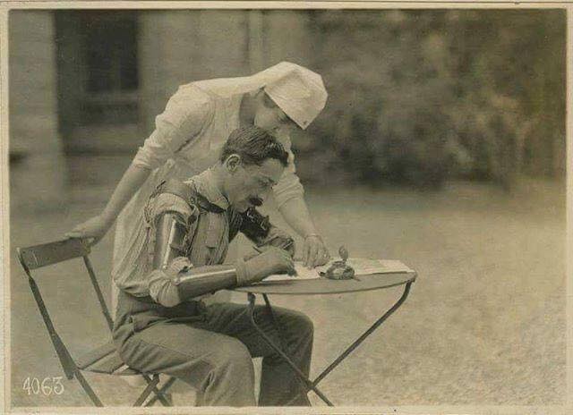 French Soldier with two prosthetic arms learning to write again, WW1.