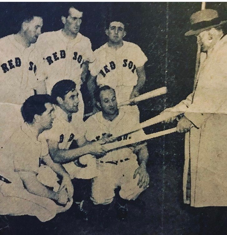 FinbarrMDowlin1's tweet photo. @Higgins30400 This photo features my Dad (taking the bat) and the greatest hurler of all-time Christy Ring, in Red Sox uniforms.  They were playing a Hurling Exhibition at Fenway and did a photo promo.  My day ended up getting a trial and a contract offer - 6 months……which he turned down 😐 https://t.co/Bb9KCSr796