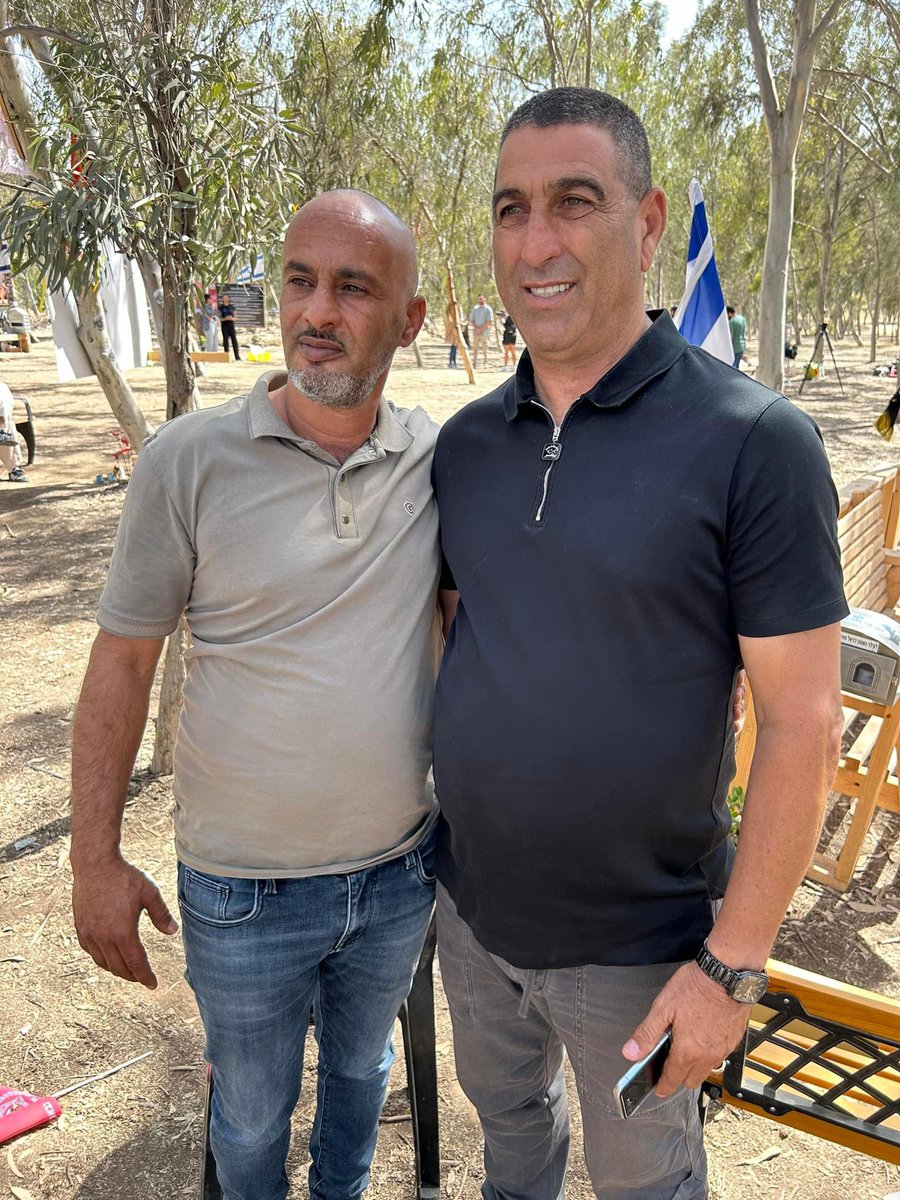 Left, Israeli Arab Amir Hujierat is reunited for the first time with Rami Davidyan. Rami saved Amir's life, and the lives of 750 young people at the Nova Music Festival.