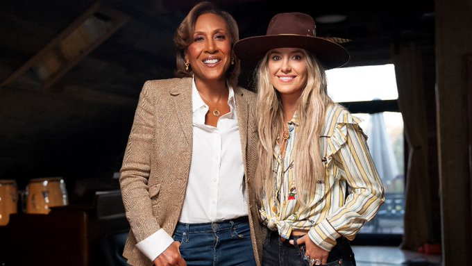 RollingStone's tweet photo. Lainey Wilson is reflecting on her journey in Lainey Wilson: Bell Bottom Country, a new special about the country star’s life and success, set to release on Hulu on May 29.

More: https://t.co/tdSDF3WlVl