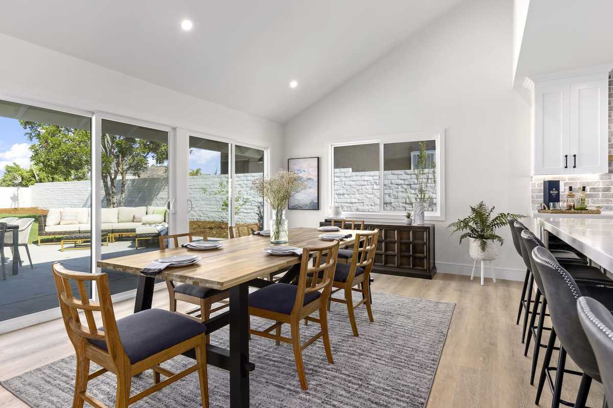 Effortlessly blend indoor and outdoor living with this stunning open-concept dining area.🍽️💡Boasting a modern yet cozy aesthetic, the space invites you to gather and entertain in luxurious comfort. 

#OpenFloorPlan #DiningRoom #LaPlacaDevelopment