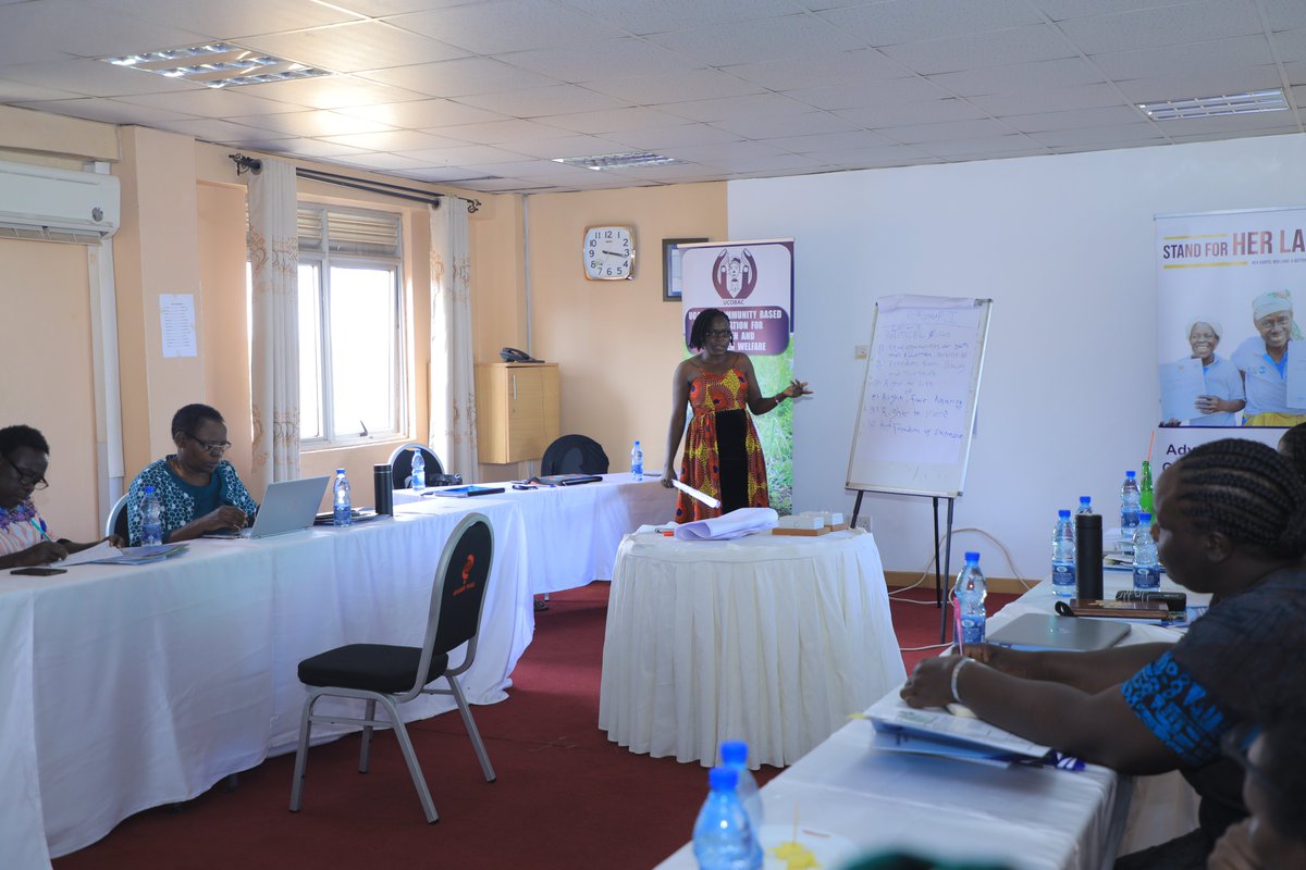 The training is participatory, with participants currently actively engaged in a group activity discussing civil and political rights among others.