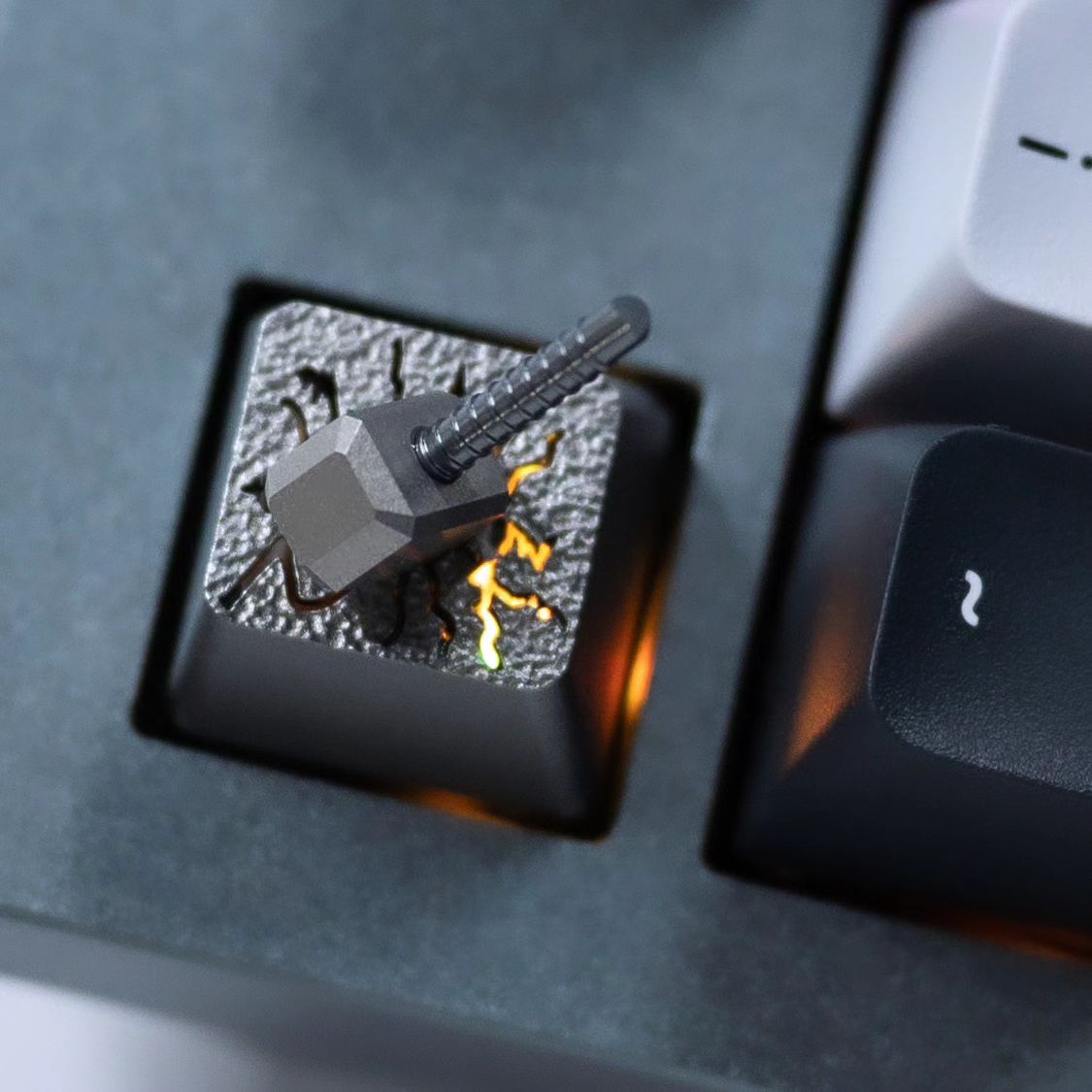 Channel your inner strength with this Hammer Artisan Keycap! ️

This bad boy is made from a titanium alloy hammerhead and aluminium alloy base for a premium feel and a touch of power on your keyboard.

#keychron #keychronindia #keycaps #mechkeys #artisan #thor