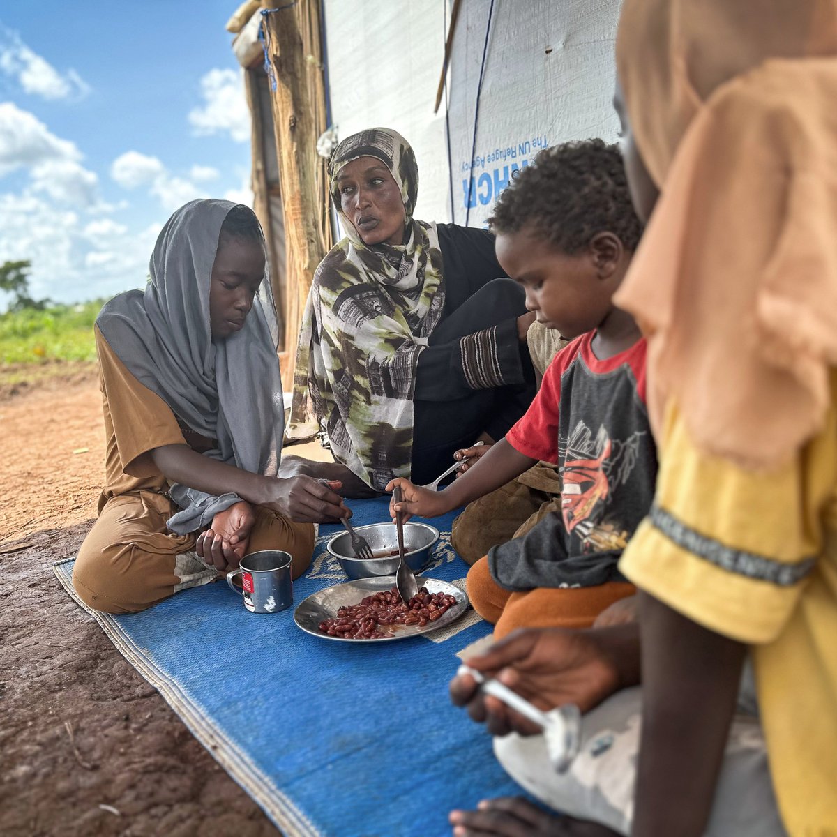 Aziza Saleh, once a social worker working for displaced people in #Sudan, is now a refugee in Kiryandongo, #Uganda. Displaced by the #SudanCrisis, Aziza relies on food rations to provide for her children.

#SudanCrisis