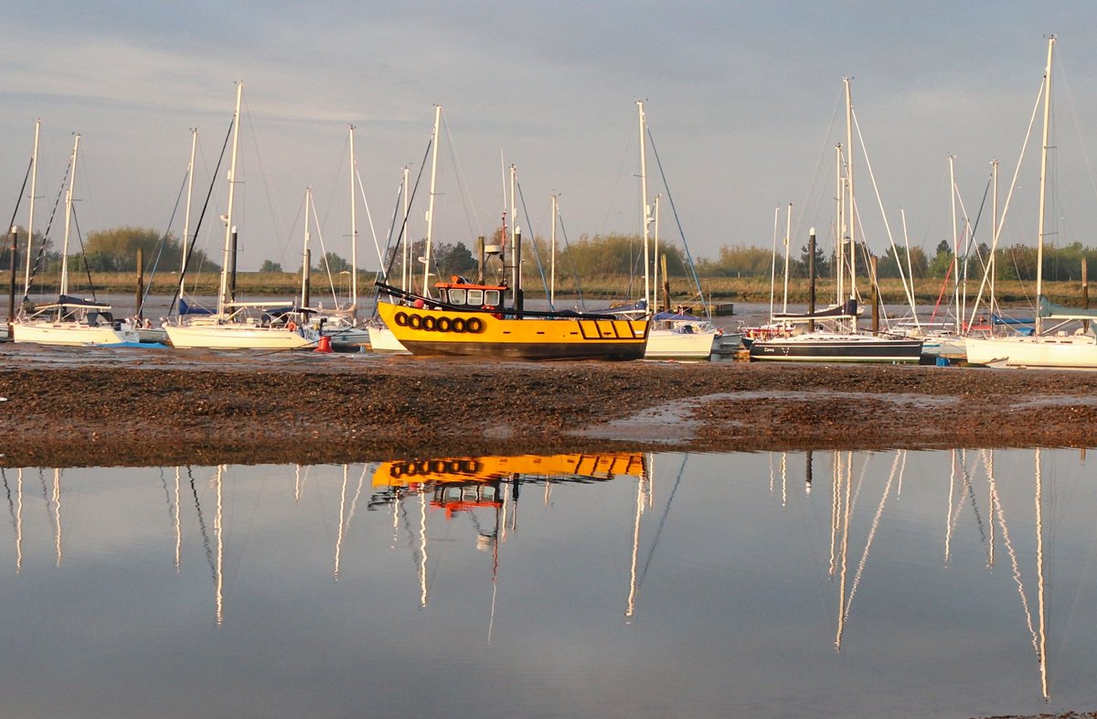 Calm morning reflections over the Brightlingsea Harbour.