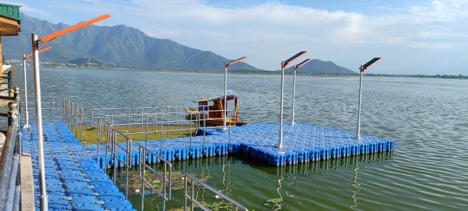 Wular Lake's allure shines brighter with the introduction of a floating jetty, beckoning travelers to explore its wonders sustainably. Dive into a world of natural splendor and rich heritage! 🌍✨ #EcoTravel #WularBeauty