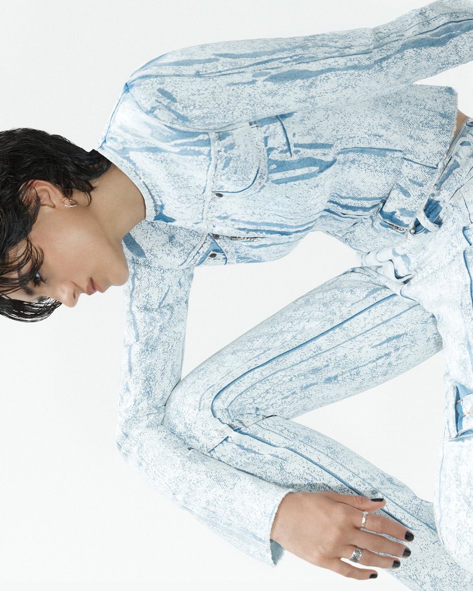 Pigment print on stone-bleached denim — a new treatment for SS24. Sasha Calle wears new arrivals for the season. Shop the runway collection at bit.ly/3y8wBxv and in-store.   Photographer: Thomas Lohr Stylist: Léopold Duchemin Talent Stylist: Chloe and Chenelle Delgadillo