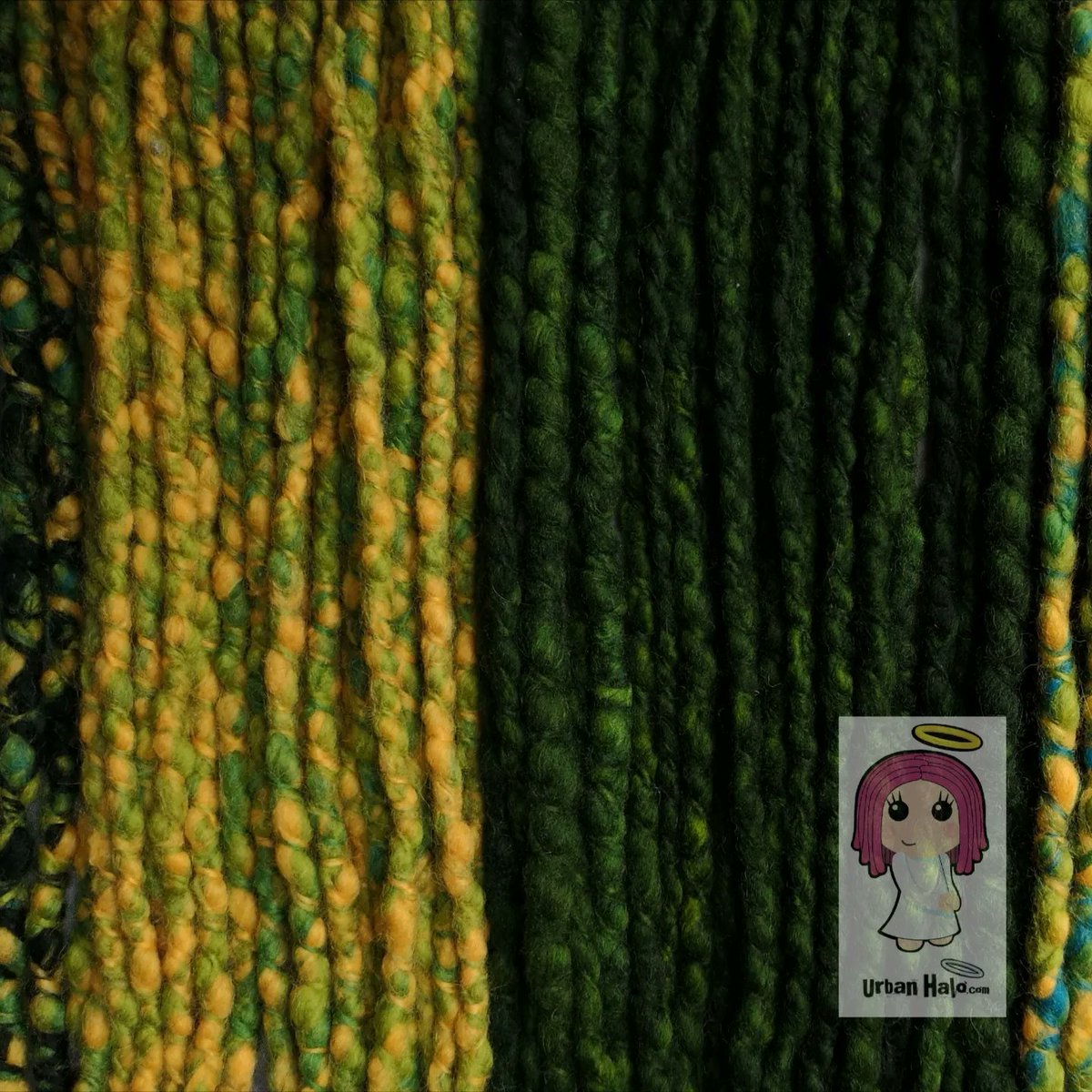 Tropical multicoloured wool dreadfalls I made in a special high-textured style. 💚💛💙😇

#urbanhalouk #dreadlocks #dreads #wooldreadlocks #wooldreads #greendreads #yellowdreads #ukdreads #ukdreadlocks #dedreads #customdreads #mermaidhair #dreadlove #dreadgoals #fantasyhair