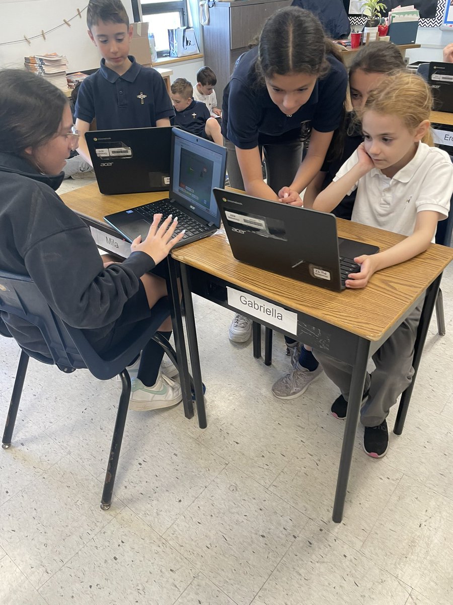 Grade 6s coding with their learning buddies.