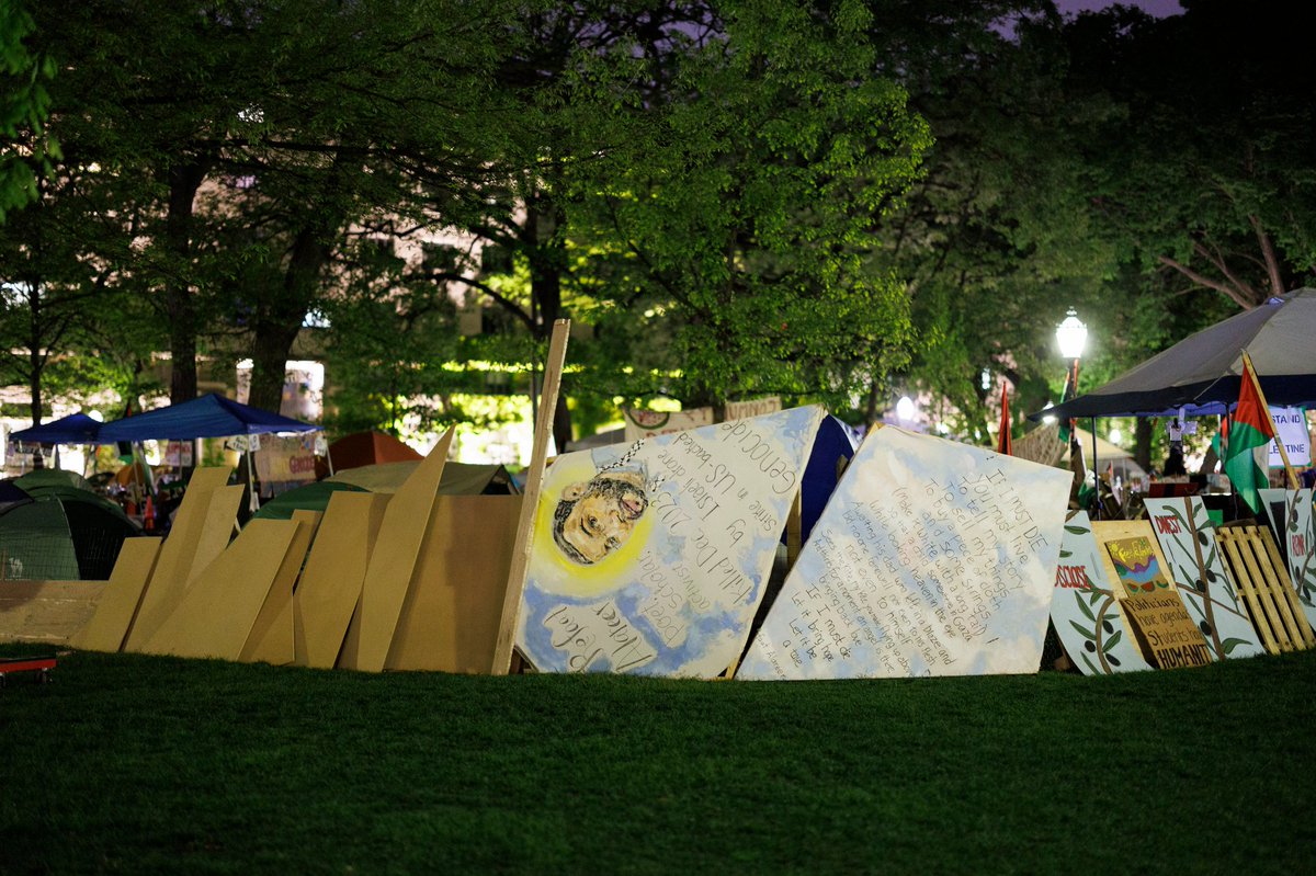 Activists gather overnight at a pro-Palestinian encampment at the University of Chicago Monday in Chicago.