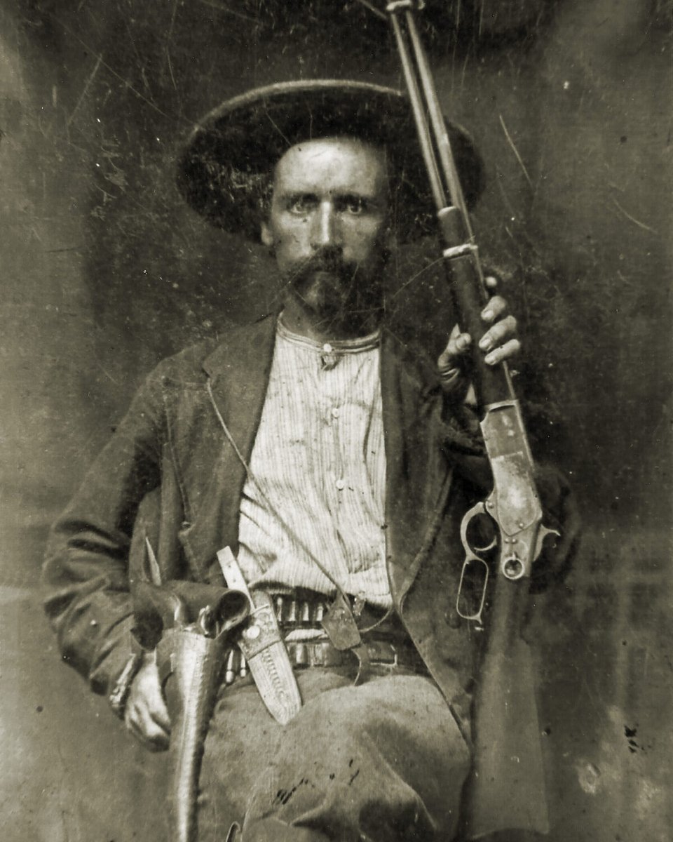 Diving into History: Lever Guns Edition. Texas Ranger Jim Hawkins of Company D rests his hand behind the holstered Colt Single Action Army while displaying his well-worn Winchester '73. #brownells #historyinpictures #leveraction #texasrangers