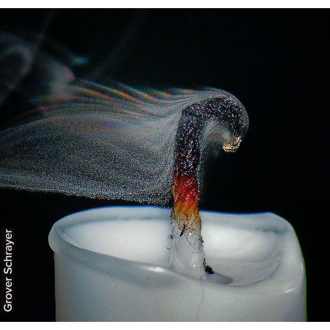 Smoke resolved into its component droplets of wax, with zones of refraction making rainbows on the upper edge. From: tinyurl.com/yahjevb5
