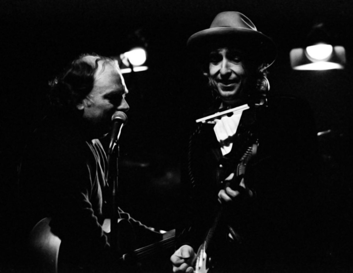 Bob Dylan is joined on stage by Van Morrison during a performance at the Dundonald Ice Bowl, Belfast, Ireland, 1991. 📸: Paul Bell. #BobDylan #Dylan