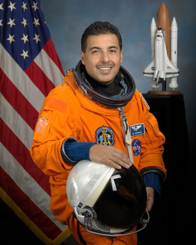 USCIS's tweet photo. On #NationalSpaceDay, we salute the immigrants and their children who make space exploration possible! José M. Hernández’s parents were migrant farm workers from Mexico, and he joined them in agricultural work on school breaks. ⬇️ https://t.co/Bkd8n9KZ58
