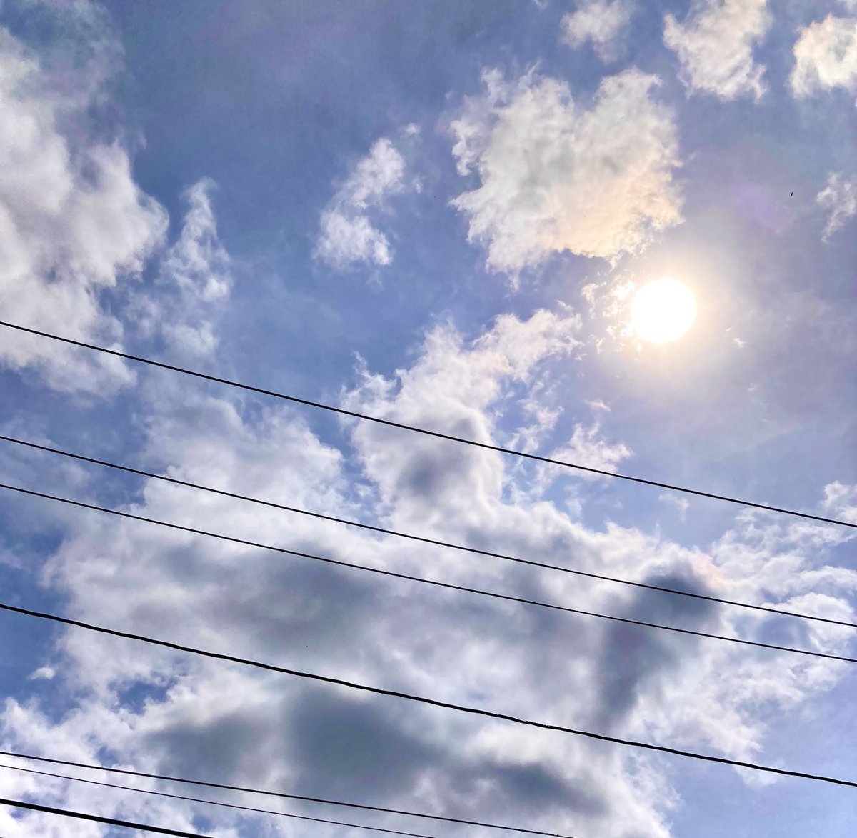 #NaturePhotography
#Naturephotography
#photography #Photography 
#nature #naturelovers
#bluesky #sky #sunrays #Monday 
#cottoncandyclouds #outside #seasons 
#May #naturesbeauty #telephonewire
#Spring #sun #suncolors #clouds