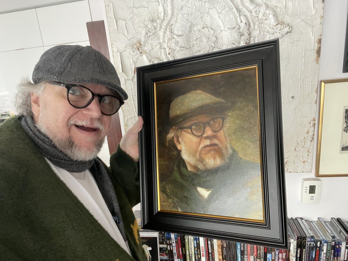 @RealGDT with his portrait. Feels so surreal, one of the greatest storytellers and directors of our time. Huge thanks to Tamara Deverell for making a sneak photo of Maestro on set.