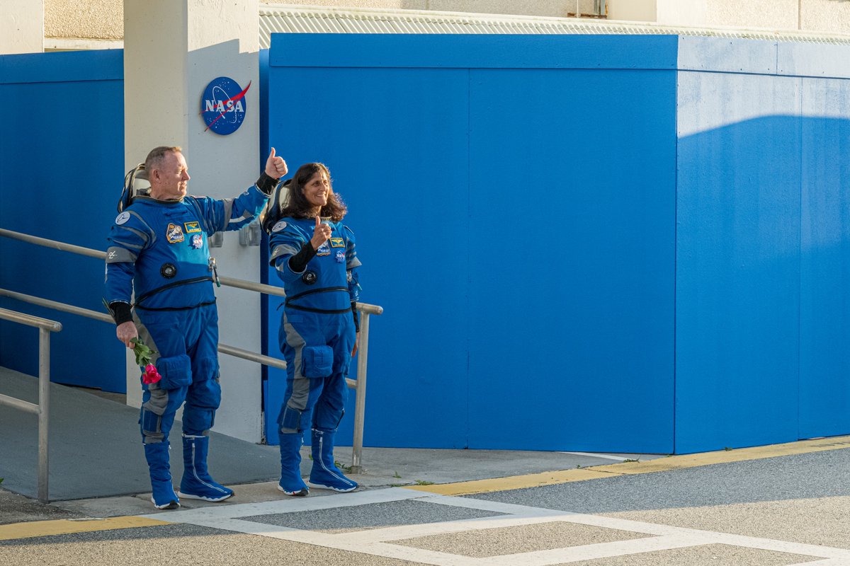 Butch and Suni depart the Neil Armstrong Operations & Checkout Building at Kennedy Space Center, headed toward SLC-41 to board Starliner for its first crewed launch at 10:34pm ET