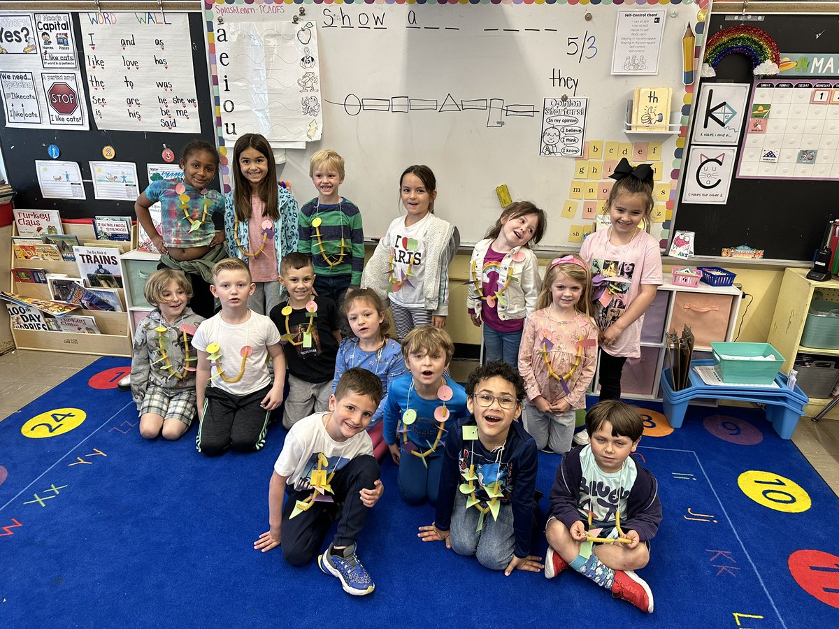 MsDalyOP's tweet photo. We are having lots of fun with shapes in kindergarten! Students listened to riddles about the shapes attributes and had to select the correct shape to string onto their necklaces! https://t.co/h8m8tCrJel