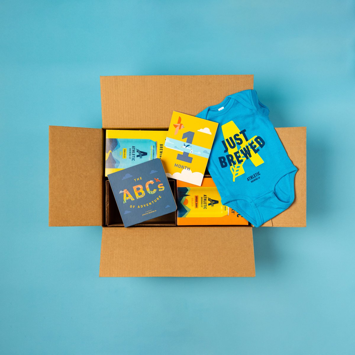 Looking for a gift for brew-loving parents? Check out our Stork Bundle! It's a special mix pack of NA brews plus a few extra gifts for their new pint sized person. Shop now for Mother's Day at athleticbrewing.com 💙