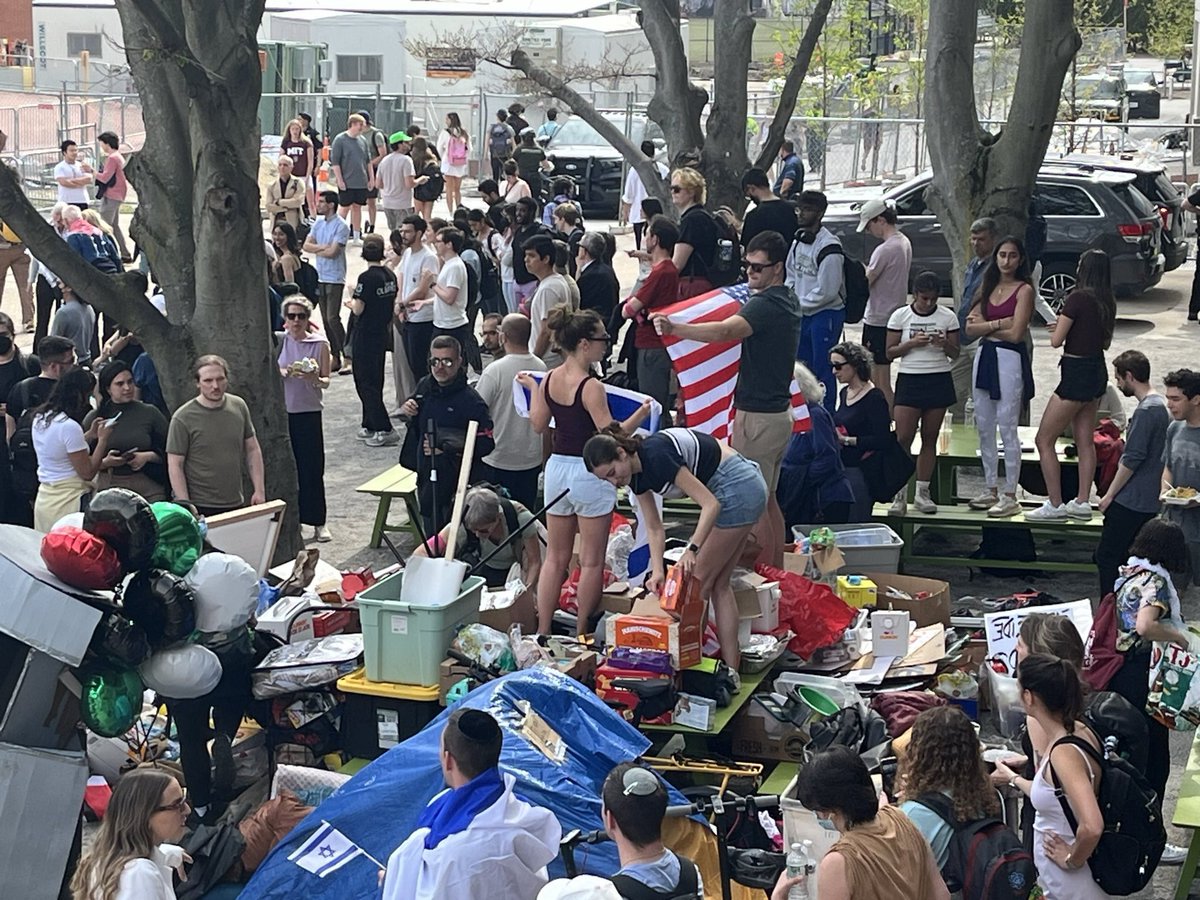 Pro-Israel counter protesters are literally looting the MIT Scientists Against Genocide Encampment supplies and food (even though they’ve been offered food consistently since the camp began)