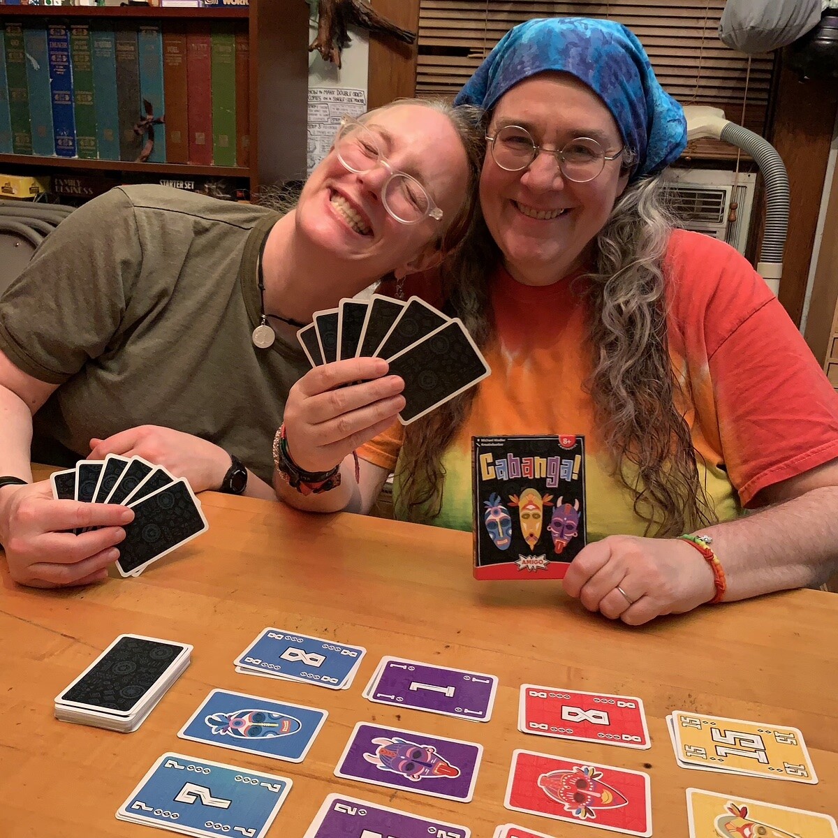 Our friends, John & Gina, returned from The Gathering with new #games & Kristin & Alison enjoyed the first #game up: Cabanga! by @AMIGO_GamesUS Players try to empty their hand by adding a card to a pile so that nobody else has any of the numbers in between. #WhatDidYouPlayMondays