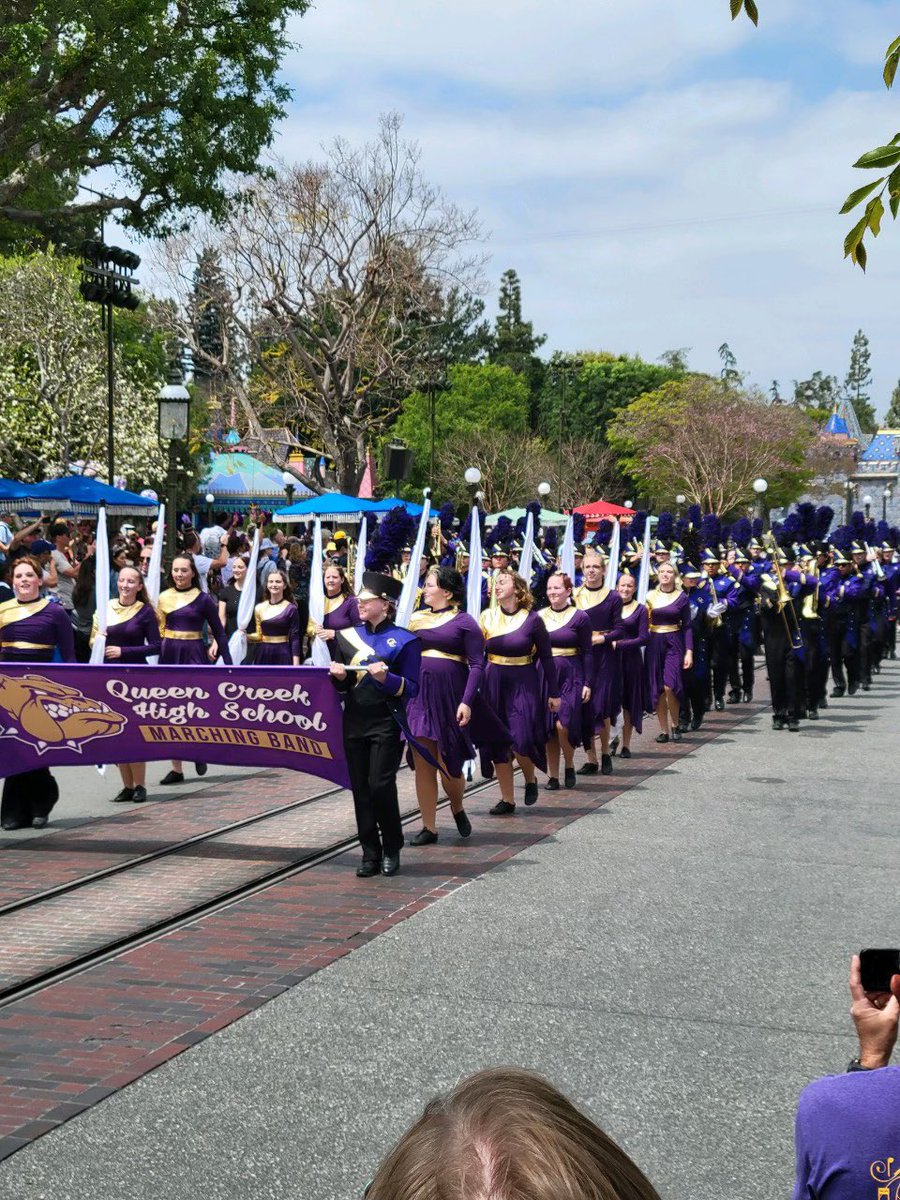 Your marching band marching through Disneyland! #bulldogproud #qcleads #championmentality