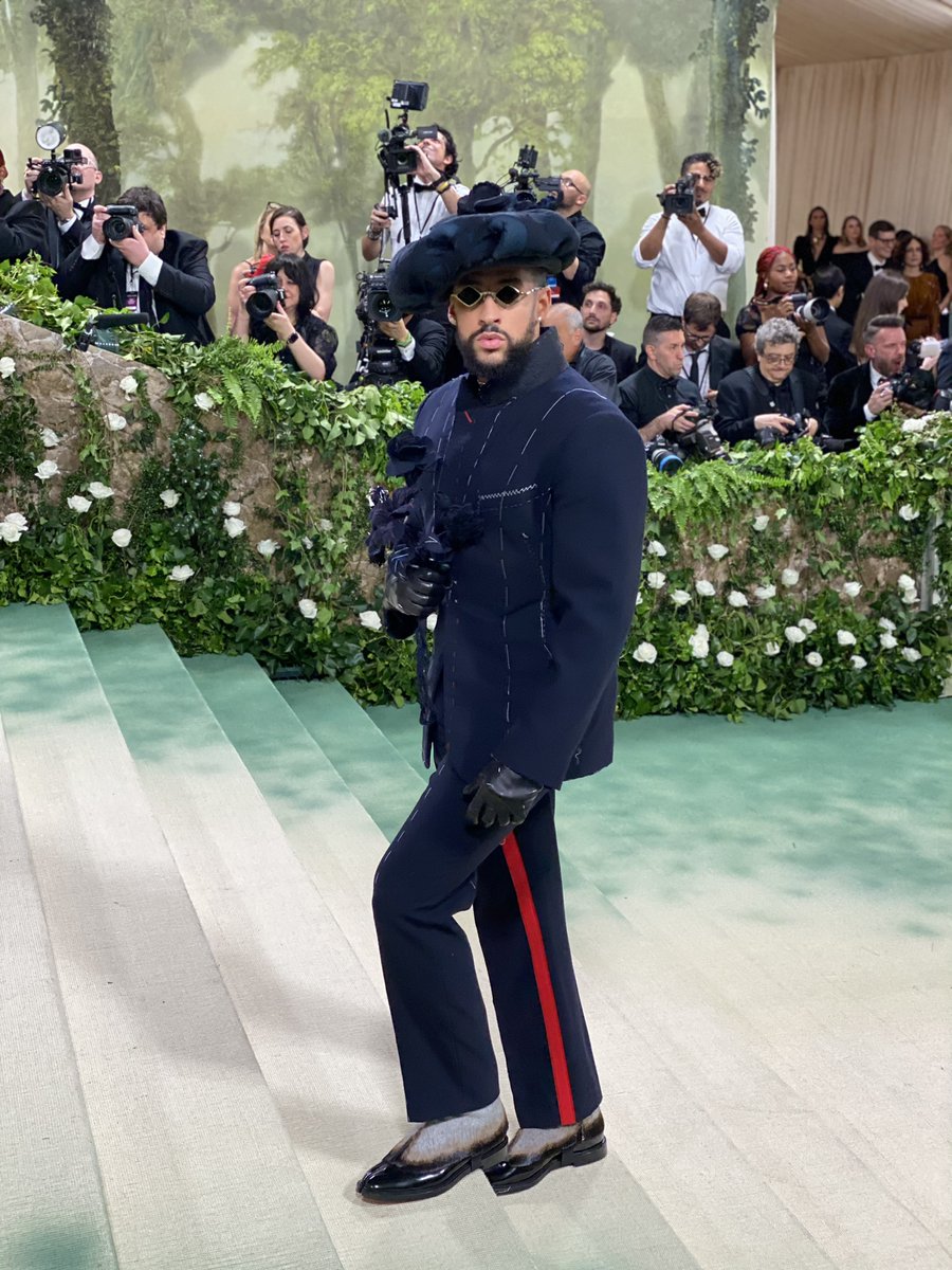 Co-chair #BadBunny arrives in bloom on the #MetGala red carpet. 🌹