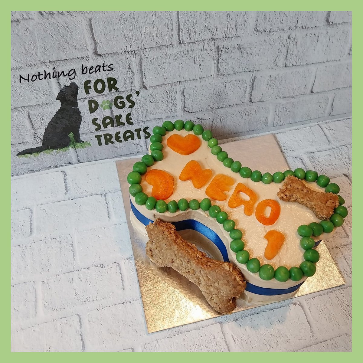 A bone shaped fish cake smothered in home made peanutbutter yoghurt frosting for Nero's 1st birthday. 💚🐶💚 #QueenOf #SmallStreamersCommunity