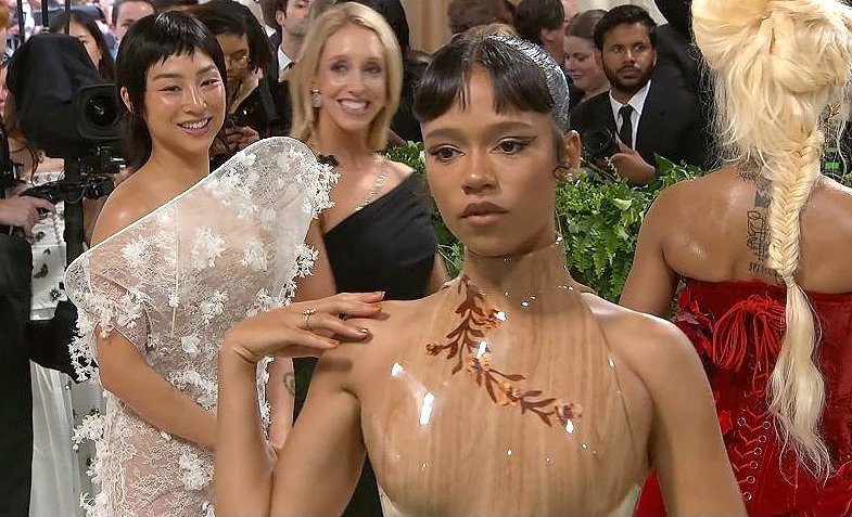 i need this picture of greta lee lovingly looking at taylor russell from a distance to be tattooed inside my brain forever #metgala