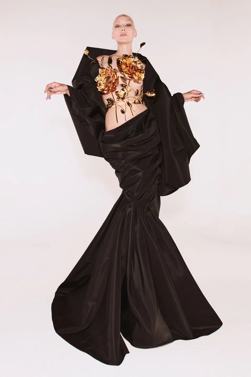 LENA MAHFOUF IS WEARING THIS LOOK FROM SCHIAPARELLI COUTURE FW21