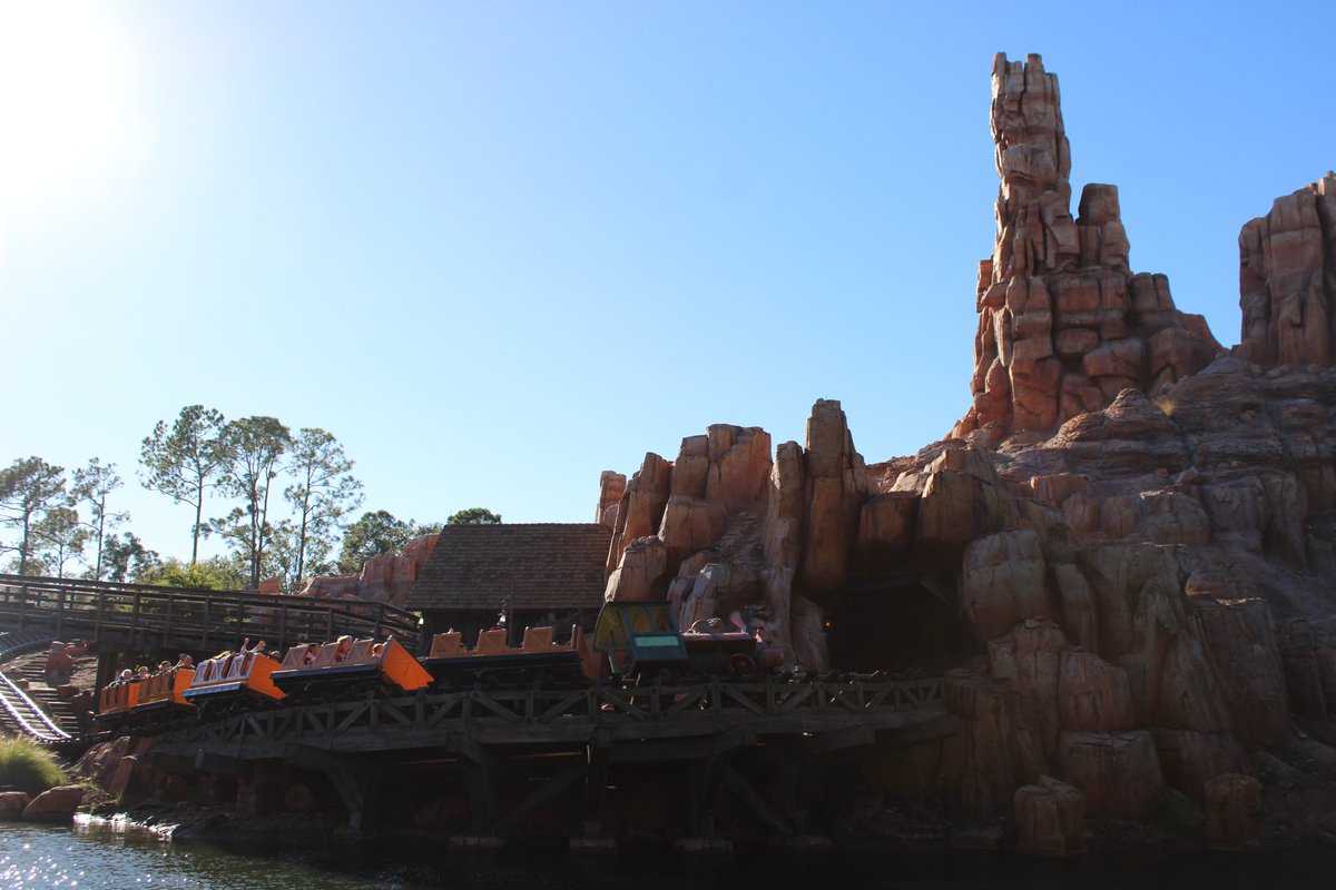 #PictureOfTheDay
Are you brave enough hop aboard the #WildestRideInTheWilderness?  A train rounds a bend on #BigThunderMountainRailroad, just feet above the #RiversOfAmerica as seen from #TomSawyerIsland in #Frontierland at #MagicKingdom Park in #WaltDisneyWorld Resort.