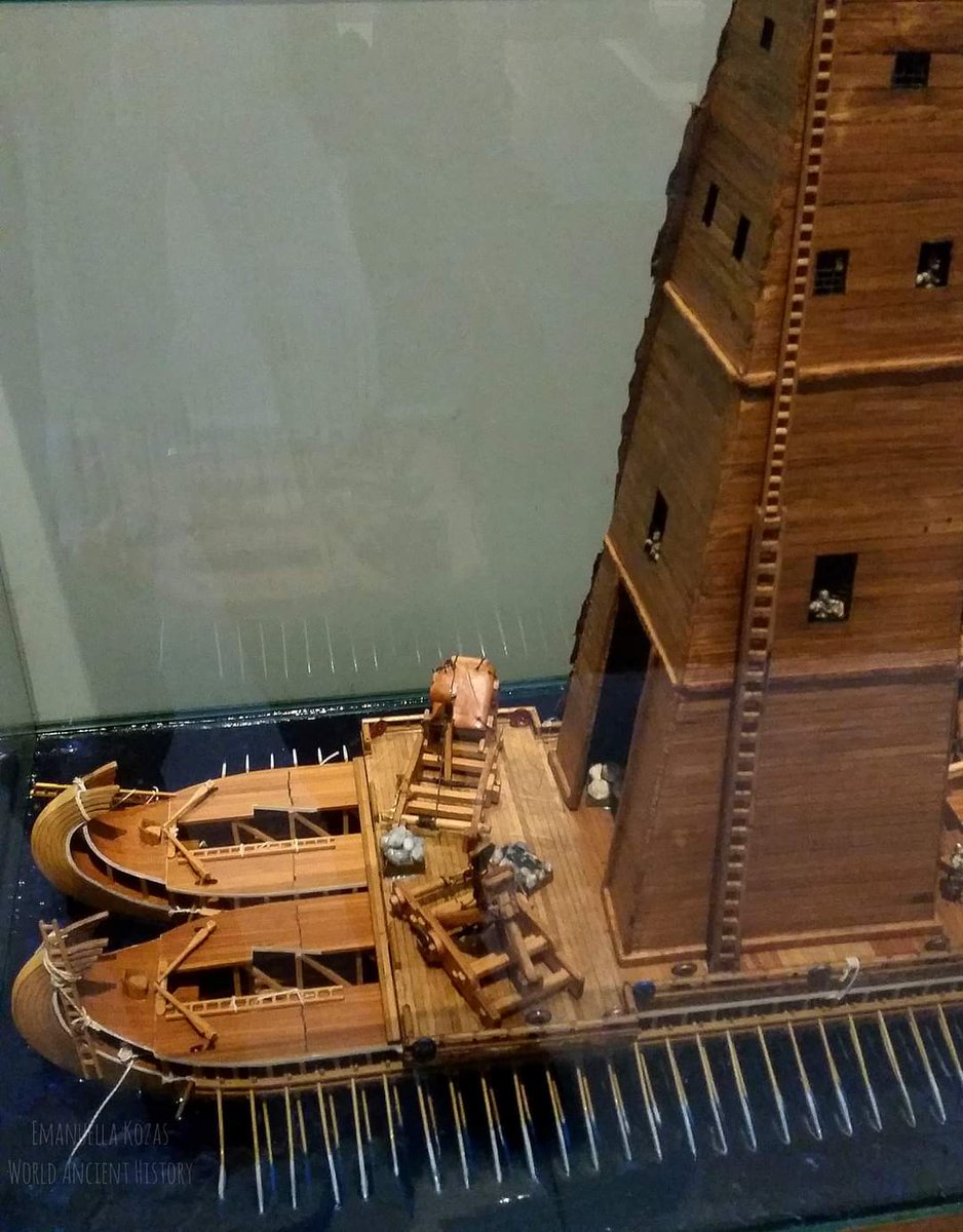 Reconstruction of an ancient Hellenic Naval Siege Engine :

Two warships were constructed side by side and had siege tower placed on top. Inside this tower was a ballista for hurling large boulders and in front of it two stone-throwing catapults. 

This model shows a…