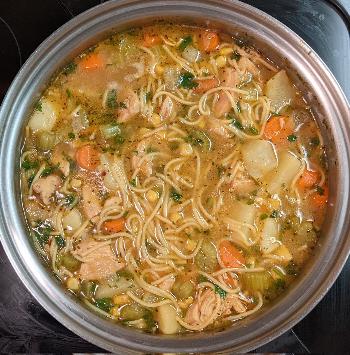 Fresh batch of Chicken Noodle Soup

#allkindsofrecipes #testkitchen #chickennoodlesoup #chickennoodle #chickensoup #soup #soupseason #chicken #fideos #noodles #onions #carrots #celery #garlic #corn #potatoes #cilantro