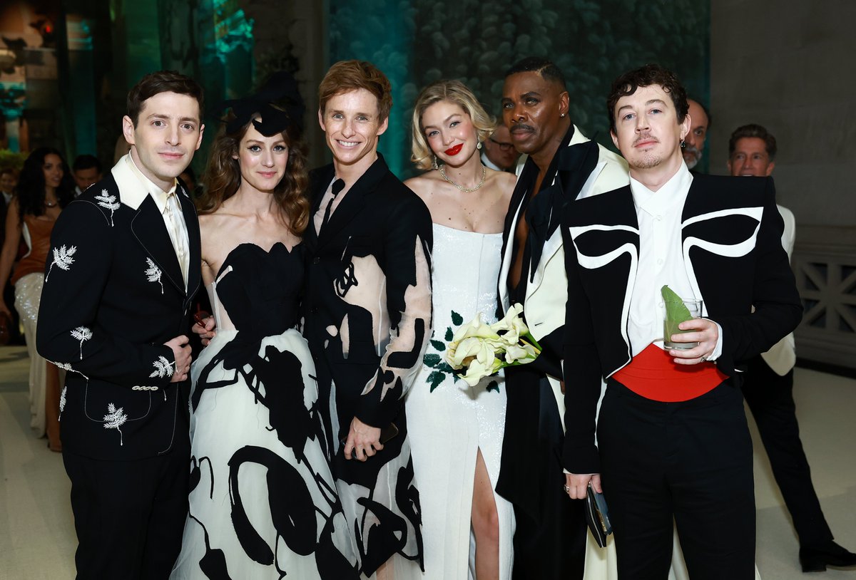 Alex Edelman, Hannah Bagshawe, Eddie Redmayne, Gigi Hadid, Colman Domingo, Alex Sharp and Luca Guadagnino pose together inside at the #MetGala.