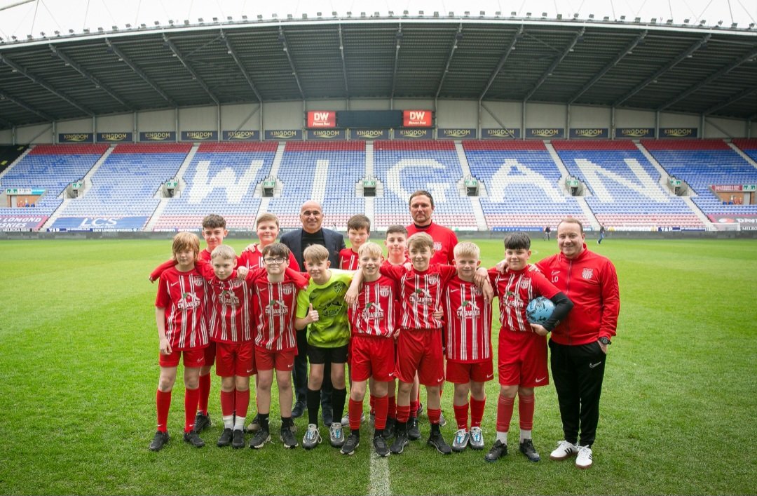 The game on Saturday was organised by our Sporting Director Mark Hayes who puts the game on annually for the charity Joseph's Goal.

FC were represented in their numbers inc our U12s Villa as mascots, pictured here with current Portugal Manager Roberto Martinez.

#UpTheStripes