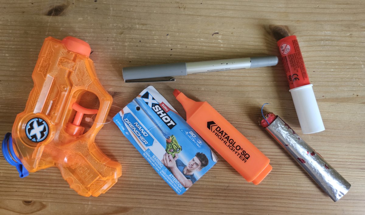 #randomfinds 1

A water gun (unused)
Orange highlighter
Pen (working) 
Vape (squashed)
Sweet 'lipstick'