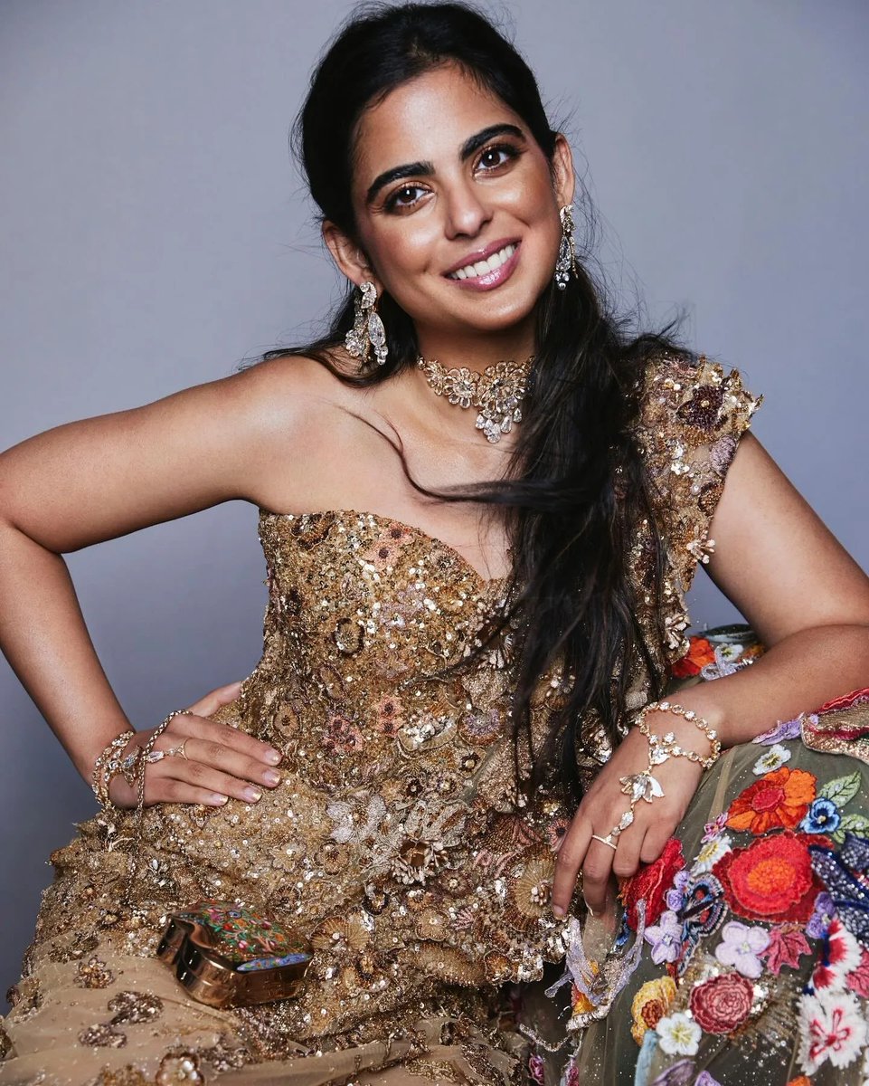 #IshaAmbani dazzles in a bespoke hand-embroidered couture sari gown by Indian designer #RahulMishra at the #MetGala, perfectly capturing the theme of '#GardenofTime'