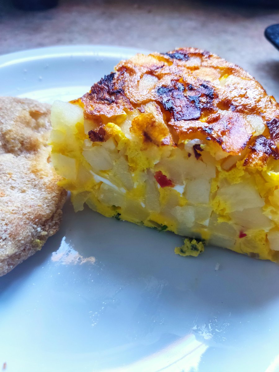 Spanish omelette. With potatoes, peppers, garlic and chives