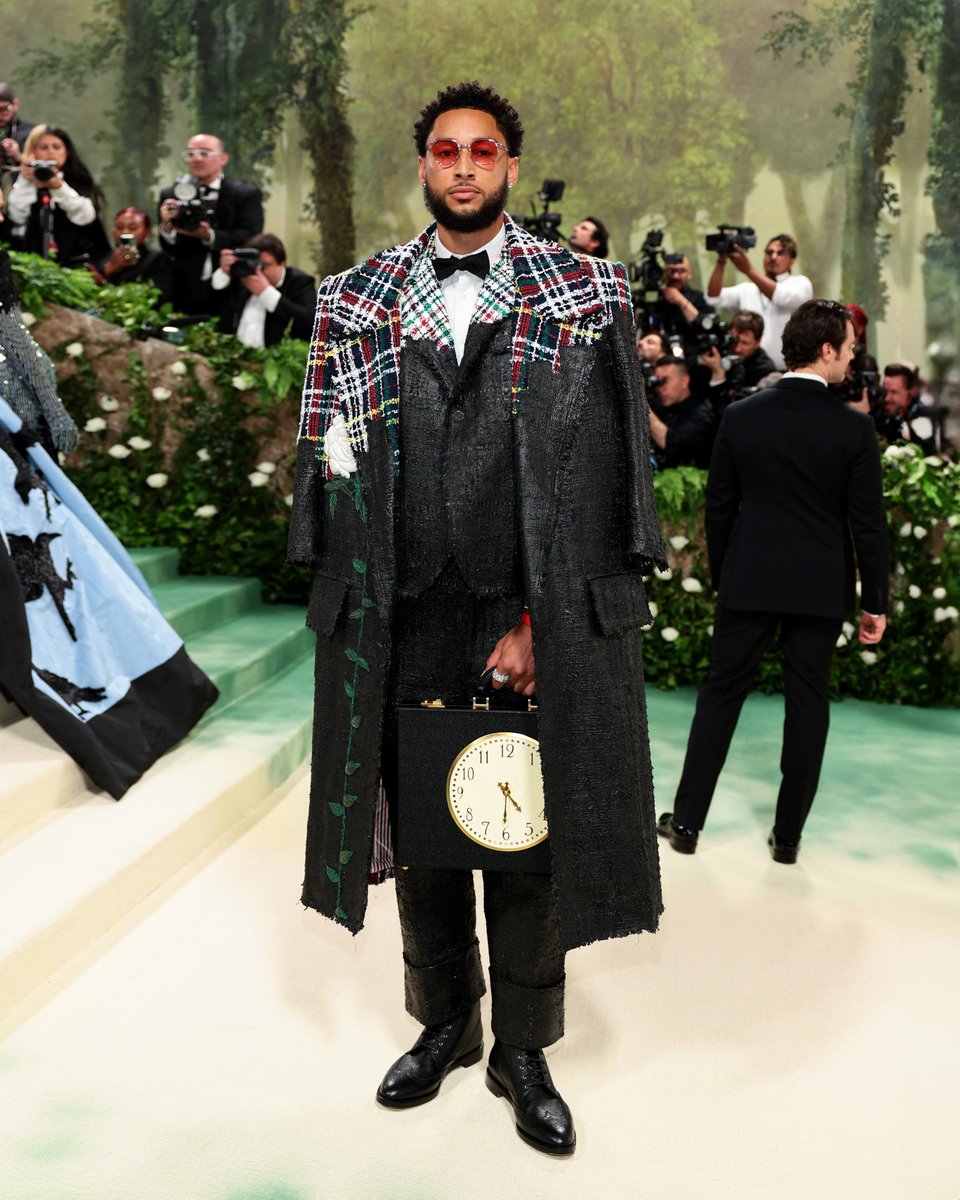 … ben … ben simmons wears a custom thom browne square-shoulder oversized coat in multi-color tartan cotton tweed over a soft shoulder jacket and trousers in multi-color gingham boucle tweed, all frayed and hand-painted in black with white bullion roses embroidered throughout…