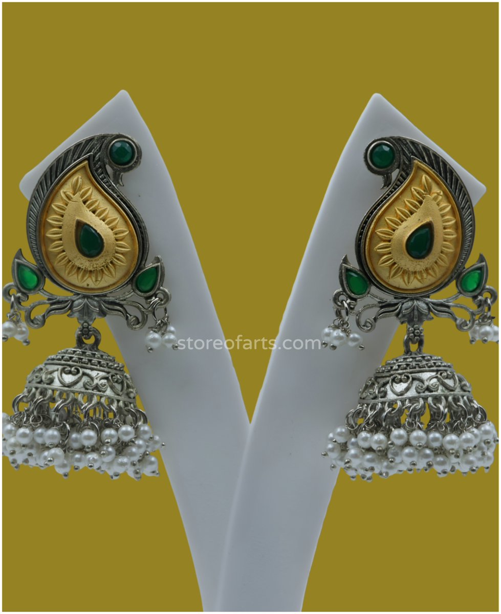 Elevate your style with these stunning German Silver Green Jhumki Earrings! 💚 Handcrafted to perfection, they effortlessly blend tradition with contemporary flair.
 Don't miss out! 
storeofarts.com/products/germa…

#FashionEssential #GreenEarrings ✨