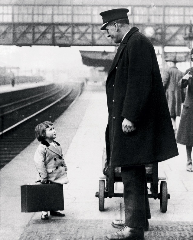George W. Hales A very young passenger asks Bristol train station operator for directions 1936