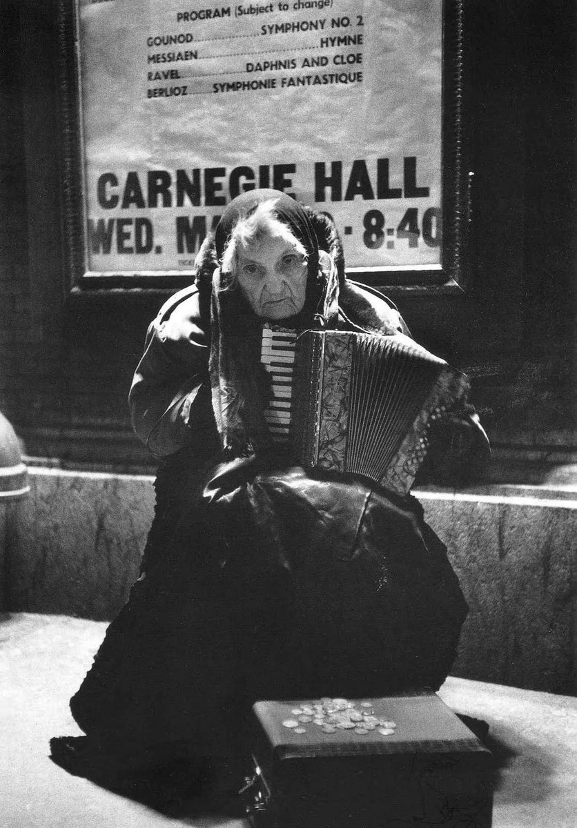 Alfred Eisenstaedt
Accordionist outside Carneggie Hall, New York