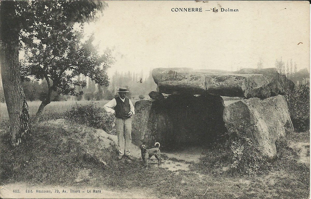 A man, a dog and a dolmen angevin – La Pierre Couverte at Duneau (Sarthe). Two chunky orthostats on each side and a terminal slab support a 7m long capstone now broken in two. Card by Housseau in Le Mans c.1905. #TombTuesday.